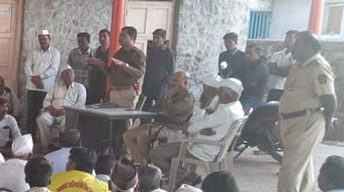 Ethnic reconciliation meeting in Talwade | तळवाडेत जातीय सलोखा बैठक
