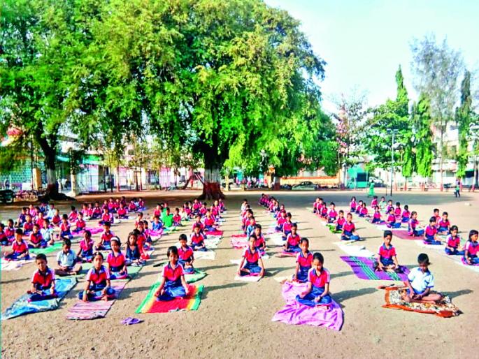 Yoga day in maval | मावळात वातावरण झाले योगमय  Yoga day in maval | मावळात वातावरण झाले योगमय