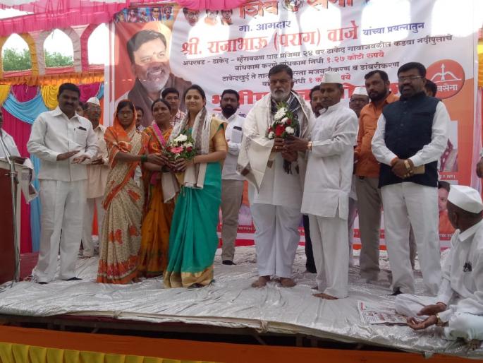 Construction of Kadwa river bridge started | कडवा नदी पुलाच्या बांधकामास प्रारंभ Construction of Kadwa river bridge started | कडवा नदी पुलाच्या बांधकामास प्रारंभ