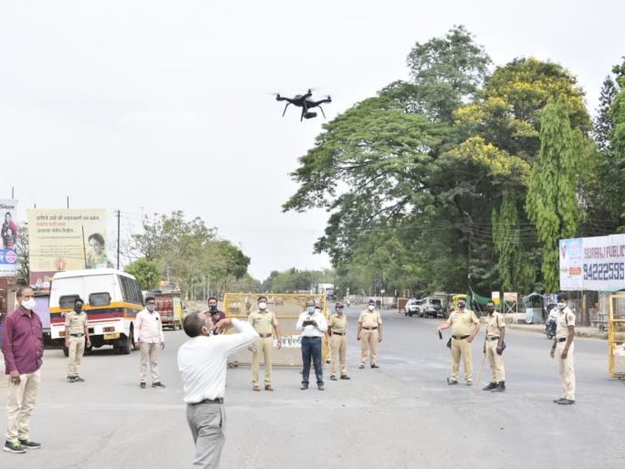 The drone's eye on Niphad's wandering for no reason | निफाडला विनाकारण फिरणाऱ्यांवर ड्रोनची नजर The drone's eye on Niphad's wandering for no reason | निफाडला विनाकारण फिरणाऱ्यांवर ड्रोनची नजर