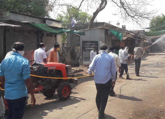 Spray the drug in Mhasavad village | म्हसावद गावात औषध फवारणी Spray the drug in Mhasavad village | म्हसावद गावात औषध फवारणी
