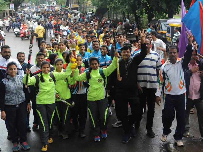 Kolhapur: For the sake of National Sports Day, torch campaign | कोल्हापूर : राष्ट्रीय क्रीडादिनानिमित्त मशाल मिरवणूक उत्साहात Kolhapur: For the sake of National Sports Day, torch campaign | कोल्हापूर : राष्ट्रीय क्रीडादिनानिमित्त मशाल मिरवणूक उत्साहात