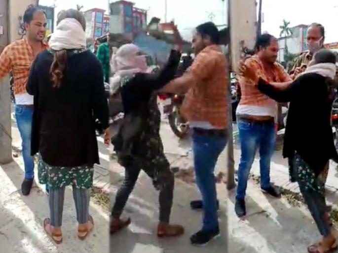 Husband wife fight on the road in Meerut | पतीला दुसऱ्या महिलेसोबत मार्केटमध्ये पाहून भडकली पत्नी, भर रस्त्यात दोघांमध्ये हाणामारी.... Husband wife fight on the road in Meerut | पतीला दुसऱ्या महिलेसोबत मार्केटमध्ये पाहून भडकली पत्नी, भर रस्त्यात दोघांमध्ये हाणामारी....