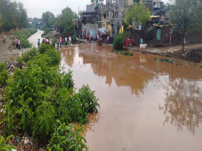 Milmili river floods in April due to unseasonal weather: rain in Yavatmal, Babhulgaon, Mahagaon | अवकाळीमुळे एप्रिलमध्ये आला मिलमिली नदीला पूर: नेरमध्ये गारपीट Milmili river floods in April due to unseasonal weather: rain in Yavatmal, Babhulgaon, Mahagaon | अवकाळीमुळे एप्रिलमध्ये आला मिलमिली नदीला पूर: नेरमध्ये गारपीट