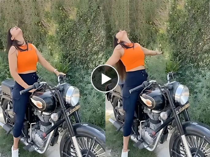 Girl fell down from bullet while dancing on patli kamariya watch viral video | बुलेटवर बसून 'पतली कमरिया' वर डान्स करत होती तरूणी, नंतर जे झालं ते बघून पोट धरून हसाल Girl fell down from bullet while dancing on patli kamariya watch viral video | बुलेटवर बसून 'पतली कमरिया' वर डान्स करत होती तरूणी, नंतर जे झालं ते बघून पोट धरून हसाल