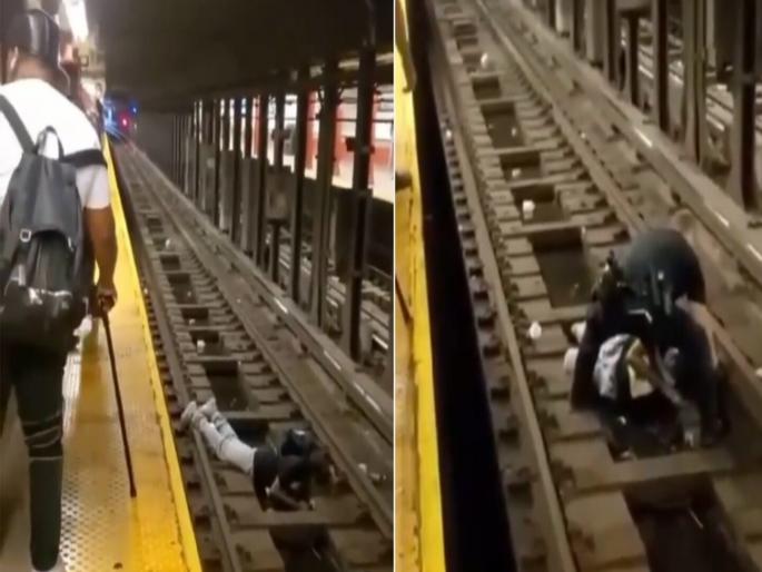 Viral video : Man fainted on platform and fell on the railway tracks | Video: बेशुद्ध होऊन रेल्वे ट्रॅकवर पडला होता 'तो', काही सेकंदाच्या अंतरावर होता मृत्यू अन् तेव्हाच Viral video : Man fainted on platform and fell on the railway tracks | Video: बेशुद्ध होऊन रेल्वे ट्रॅकवर पडला होता 'तो', काही सेकंदाच्या अंतरावर होता मृत्यू अन् तेव्हाच