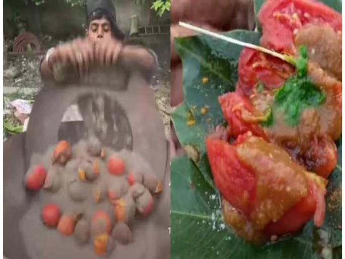 tomato chaat roasted in sand video goes viral on social media | वाळूत घातले टॉमेटो, त्यापासून बनवले चाट, ही रेसिपी पाहुन नेटकऱ्यांनी मारला डोक्यावर हात tomato chaat roasted in sand video goes viral on social media | वाळूत घातले टॉमेटो, त्यापासून बनवले चाट, ही रेसिपी पाहुन नेटकऱ्यांनी मारला डोक्यावर हात