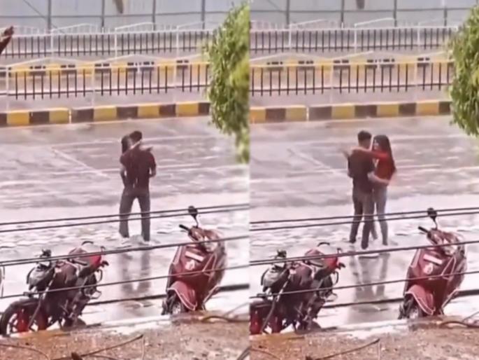 A video of a couple dancing in the rain in Indore, Madhya Pradesh is going viral | VIDEO : मौसम मस्ताना...! पावसाचं प्रेमी युगुलाकडून असंही स्वागत; भररस्त्यातच थिरकले A video of a couple dancing in the rain in Indore, Madhya Pradesh is going viral | VIDEO : मौसम मस्ताना...! पावसाचं प्रेमी युगुलाकडून असंही स्वागत; भररस्त्यातच थिरकले