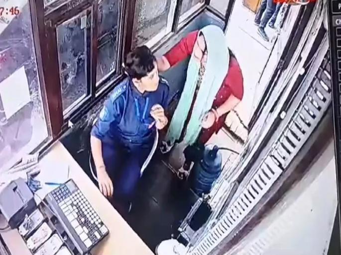 A video of a woman being bullied for demanding toll in Uttar Pradesh's Greater Noida is going viral on social media | VIDEO : टोलच्या मागणीवरून दादागिरी! महिला कर्मचाऱ्याचे केस ओढले अन्...; घटना CCTVत कैद A video of a woman being bullied for demanding toll in Uttar Pradesh's Greater Noida is going viral on social media | VIDEO : टोलच्या मागणीवरून दादागिरी! महिला कर्मचाऱ्याचे केस ओढले अन्...; घटना CCTVत कैद