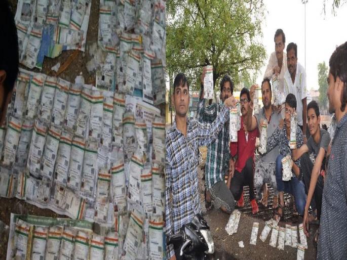 Yavatmal: Hundreds of Aadhaar cards found in wells | यवतमाळ : विहिरीत सापडले शेकडो आधार कार्ड, विहीर उपसताना उलगडले रहस्य Yavatmal: Hundreds of Aadhaar cards found in wells | यवतमाळ : विहिरीत सापडले शेकडो आधार कार्ड, विहीर उपसताना उलगडले रहस्य