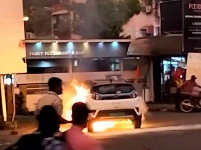 Tata Nexon EV catches fire video: Incidents in Vasai near Mumbai | Video: टाटा नेक्सॉन ईव्ही देखील पेटली; मुंबईजवळच्या वसईतील घटना Tata Nexon EV catches fire video: Incidents in Vasai near Mumbai | Video: टाटा नेक्सॉन ईव्ही देखील पेटली; मुंबईजवळच्या वसईतील घटना