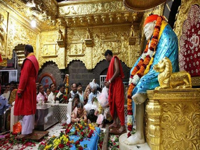 By removing the glass, devotees have started touching Sai Baba's samadhi and taking darshan in shirdi | साईभक्तांसाठी आनंदाची बातमी; काचा हटविल्याने समाधीला आता थेट स्पर्श करता येणार! By removing the glass, devotees have started touching Sai Baba's samadhi and taking darshan in shirdi | साईभक्तांसाठी आनंदाची बातमी; काचा हटविल्याने समाधीला आता थेट स्पर्श करता येणार!