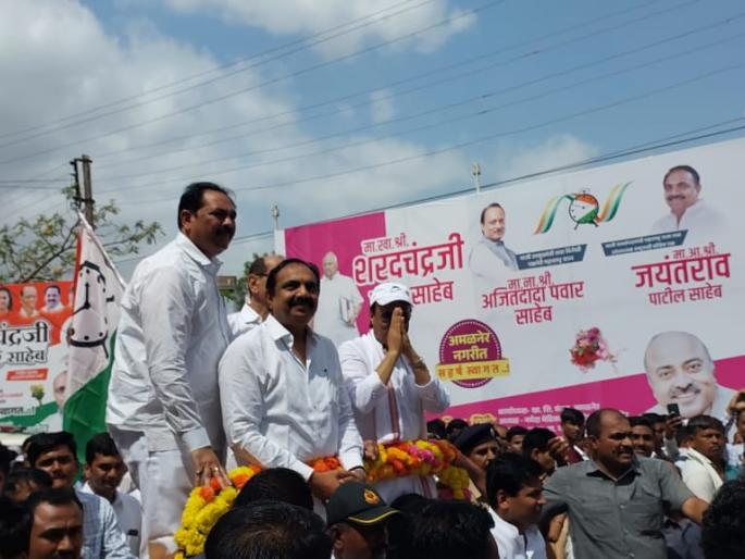 ajit pawar road show in amalner | अजित पवार यांचा अमळनेरात रोड शो ajit pawar road show in amalner | अजित पवार यांचा अमळनेरात रोड शो