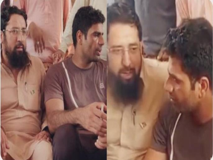 paris olympics 2024: Pakistan's gold medalist Arshad Nadeem met terrorist leader Haris Dar, video goes viral | पाकिस्तानचा सुवर्णपदक विजेता अर्शद नदीमची दहशतवादी नेता हारिस डारने घेतली भेट, व्हिडीओ व्हायरल paris olympics 2024: Pakistan's gold medalist Arshad Nadeem met terrorist leader Haris Dar, video goes viral | पाकिस्तानचा सुवर्णपदक विजेता अर्शद नदीमची दहशतवादी नेता हारिस डारने घेतली भेट, व्हिडीओ व्हायरल