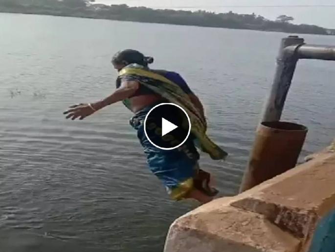 At the age of 60, a grandmother's dangerous stunt of jumping from a bridge into a river is going viral on social media | वयाच्या 60व्या वर्षी आजीने केला धोकादायक स्टंट; पुलावरून उडी मारल्याचा Video Viral At the age of 60, a grandmother's dangerous stunt of jumping from a bridge into a river is going viral on social media | वयाच्या 60व्या वर्षी आजीने केला धोकादायक स्टंट; पुलावरून उडी मारल्याचा Video Viral