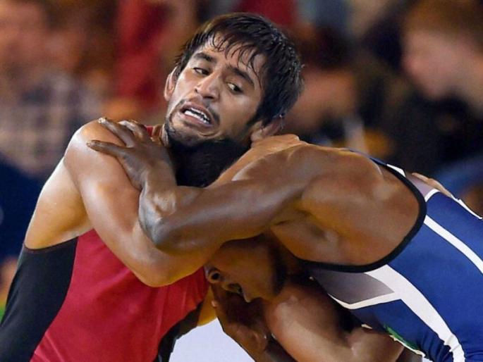 Commonwealth Games 2018 Bajrang Punia wins Gold in mens 65 kg freestyle | Commonwealth Games 2018: जय 'बजरंग' बली; कुस्तीपटू बजरंग पुनियाचा 'सोनेरी' धोबीपछाड Commonwealth Games 2018 Bajrang Punia wins Gold in mens 65 kg freestyle | Commonwealth Games 2018: जय 'बजरंग' बली; कुस्तीपटू बजरंग पुनियाचा 'सोनेरी' धोबीपछाड