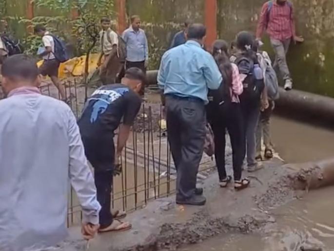 Road and drain work in Ulhasnagar partially completed Students face life-threatening challenge to cross drain | उल्हासनगरात रस्ता व नाल्याचे काम अर्धवट नाला ओलांडण्यासाठी विध्यार्थांची जीवघेणी कसरत  Road and drain work in Ulhasnagar partially completed Students face life-threatening challenge to cross drain | उल्हासनगरात रस्ता व नाल्याचे काम अर्धवट नाला ओलांडण्यासाठी विध्यार्थांची जीवघेणी कसरत