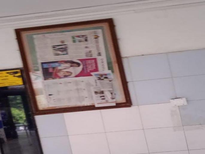 Nashik Rajiv Gandhi Bhawan but the plaque with Gandhi s photo is covered strange behavior of the coroporation | नाशिक : नाव राजीव गांधी भवन, पण गांधींच्या फोटोचा फलक झाकला, मनपाचा अजब कारभार Nashik Rajiv Gandhi Bhawan but the plaque with Gandhi s photo is covered strange behavior of the coroporation | नाशिक : नाव राजीव गांधी भवन, पण गांधींच्या फोटोचा फलक झाकला, मनपाचा अजब कारभार