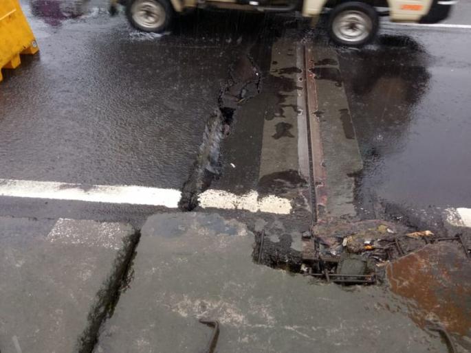 Thane, Kalyan commuters struggle with traffic jams after accident, cracks on bridge | भिवंडी बायपासवरील साकेत ब्रिजला तडे गेल्यामुळे रस्ता खचला Thane, Kalyan commuters struggle with traffic jams after accident, cracks on bridge | भिवंडी बायपासवरील साकेत ब्रिजला तडे गेल्यामुळे रस्ता खचला