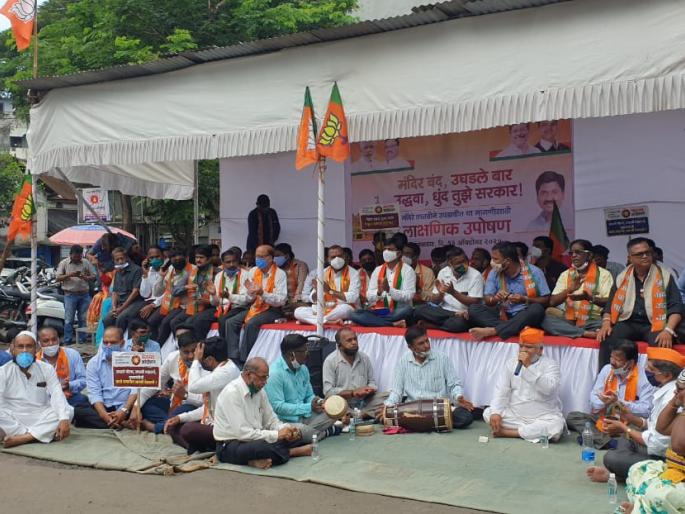 In the BJP's agitation, women came to the body | भाजपच्या आंदोलनात महिलेच्या आले अंगात In the BJP's agitation, women came to the body | भाजपच्या आंदोलनात महिलेच्या आले अंगात