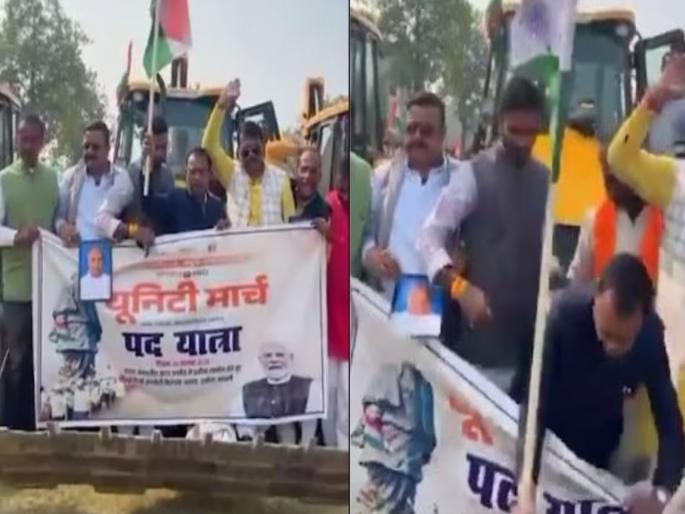 BJP leaders were taking out a padayatra on a JCB, something suddenly happened, they fell on the road | JCB वर बसून काढत होते पदयात्रा, अचानक घडलं असं काही, रस्त्यावर धपकन पडले भाजपाचे नेते BJP leaders were taking out a padayatra on a JCB, something suddenly happened, they fell on the road | JCB वर बसून काढत होते पदयात्रा, अचानक घडलं असं काही, रस्त्यावर धपकन पडले भाजपाचे नेते