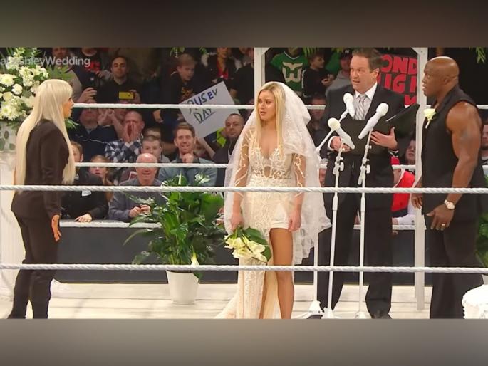 WWE : Liv Morgan returns to drop a bombshell during Lana and Bobby Lasley wedding | Video: कहानी में ट्विस्टः बॉबी लॅश्ली - लानाच्या लग्नात 'तिची' एन्ट्री अन् घडलं भयानक WWE : Liv Morgan returns to drop a bombshell during Lana and Bobby Lasley wedding | Video: कहानी में ट्विस्टः बॉबी लॅश्ली - लानाच्या लग्नात 'तिची' एन्ट्री अन् घडलं भयानक