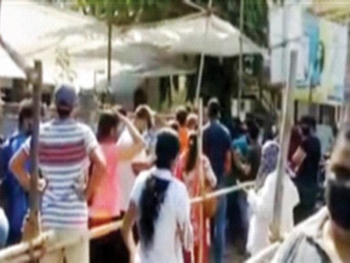 Finally resume vaccination giving priority to locals | अखेर स्थानिकांना प्राधान्य देत पुन्हा लसीकरण सुरू Finally resume vaccination giving priority to locals | अखेर स्थानिकांना प्राधान्य देत पुन्हा लसीकरण सुरू