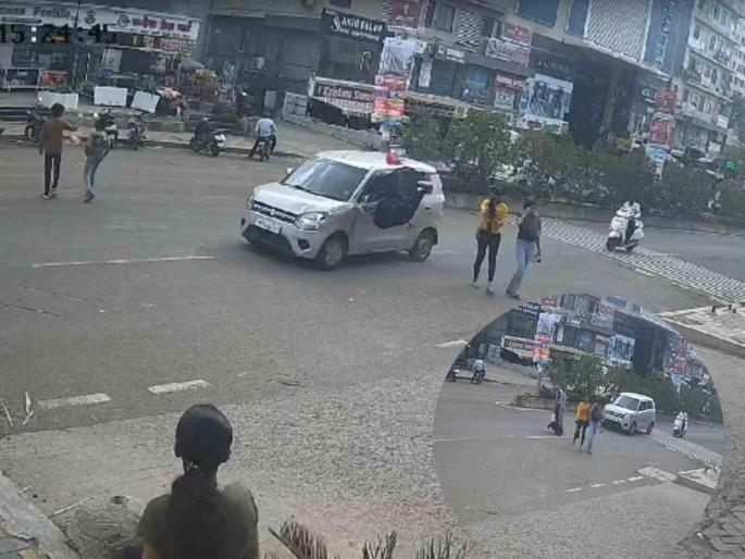Police son's car runs over woman A case was registered after the video went viral | पोलिस पुत्राच्या कारने महिलेला उडवले; व्हिडिओ व्हायरल झाल्यानंतर गुन्हा दाखल Police son's car runs over woman A case was registered after the video went viral | पोलिस पुत्राच्या कारने महिलेला उडवले; व्हिडिओ व्हायरल झाल्यानंतर गुन्हा दाखल
