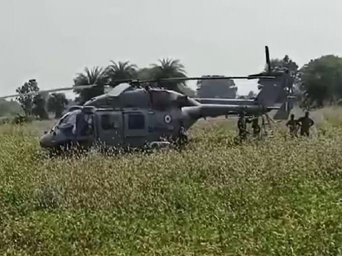 Emergency landing of Air Force helicopters in fields; Gather the village to see in madhya pradesh bairasia | Video: हवाई दलाच्या हेलिकॉप्टरची शेतात इमर्जन्सी लँडीग; पाहायला गाव गोळा