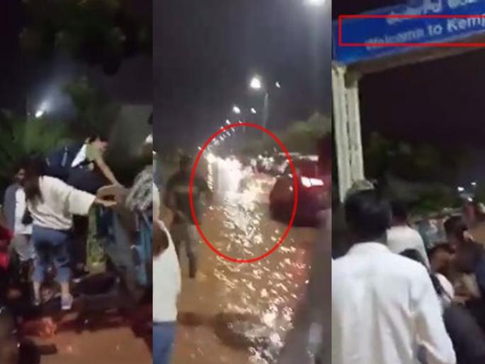 Video : Tractor rushed to the aid of passengers at the airport, video viral on bengluru kampaguda airport in karnataka | Video : विमानतळावर अडकलेल्या प्रवाशांच्या मदतीला ट्रक्टर धावला, व्हिडिओ व्हायरल Video : Tractor rushed to the aid of passengers at the airport, video viral on bengluru kampaguda airport in karnataka | Video : विमानतळावर अडकलेल्या प्रवाशांच्या मदतीला ट्रक्टर धावला, व्हिडिओ व्हायरल