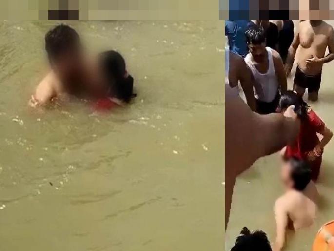 Husband and wife kiss bath in Ramkunda ayodhya sharayu, video of husband being beaten goes viral | अयोध्येतील रामकुंडात पती-पत्नीचं चुंबन स्नान, भाविकांकडून पतीला मारहाण; व्हिडिओ व्हायरल Husband and wife kiss bath in Ramkunda ayodhya sharayu, video of husband being beaten goes viral | अयोध्येतील रामकुंडात पती-पत्नीचं चुंबन स्नान, भाविकांकडून पतीला मारहाण; व्हिडिओ व्हायरल