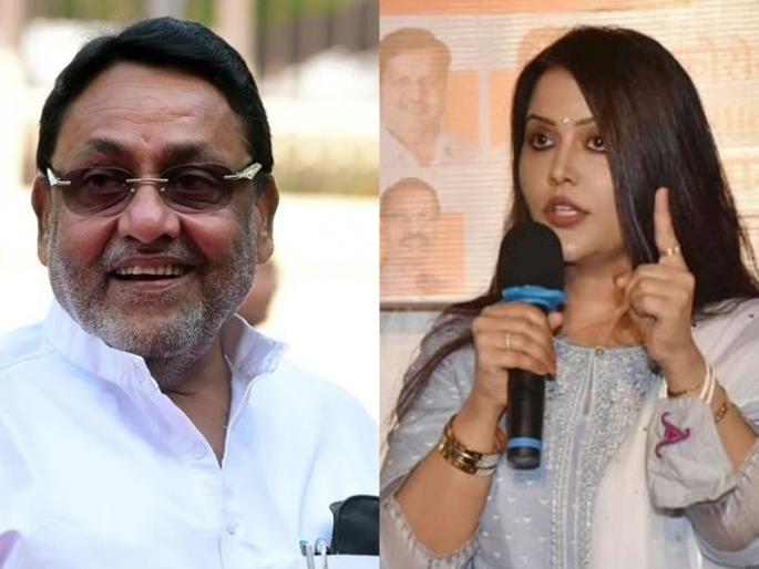 Nawab Malik : Amruta Fadnavis describes the photo shared by Malik as 'cause' | Nawab Malik : अमृता फडणवीसांनी सांगितलं राज'कारण', त्या फोटोवर दिलं स्पष्टीकरण Nawab Malik : Amruta Fadnavis describes the photo shared by Malik as 'cause' | Nawab Malik : अमृता फडणवीसांनी सांगितलं राज'कारण', त्या फोटोवर दिलं स्पष्टीकरण