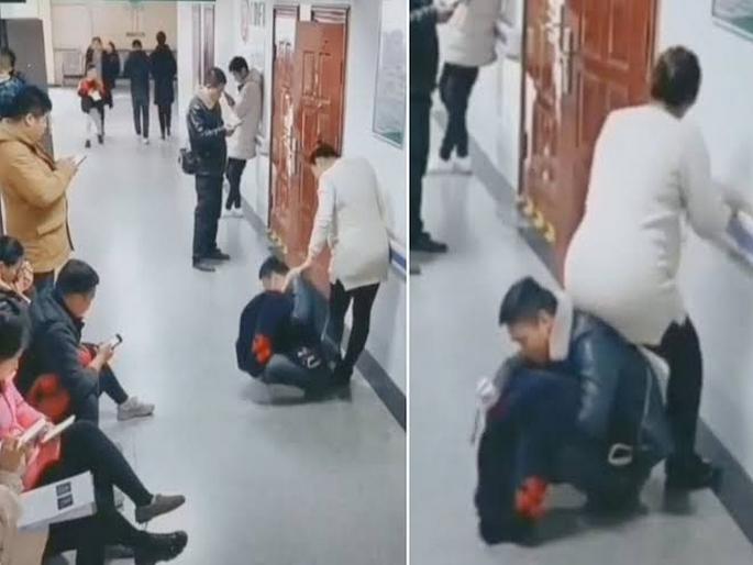 Video : Husband turns himself into a human chair after people refused offer seat to her pregnant wife in China | Video : शाब्बास रे पठ्ठया! हॉस्पिटलमध्ये कुणीच सीट दिली नाही म्हणून स्वत:च गर्भवती पत्नीसाठी झाला 'खुर्ची'! Video : Husband turns himself into a human chair after people refused offer seat to her pregnant wife in China | Video : शाब्बास रे पठ्ठया! हॉस्पिटलमध्ये कुणीच सीट दिली नाही म्हणून स्वत:च गर्भवती पत्नीसाठी झाला 'खुर्ची'!