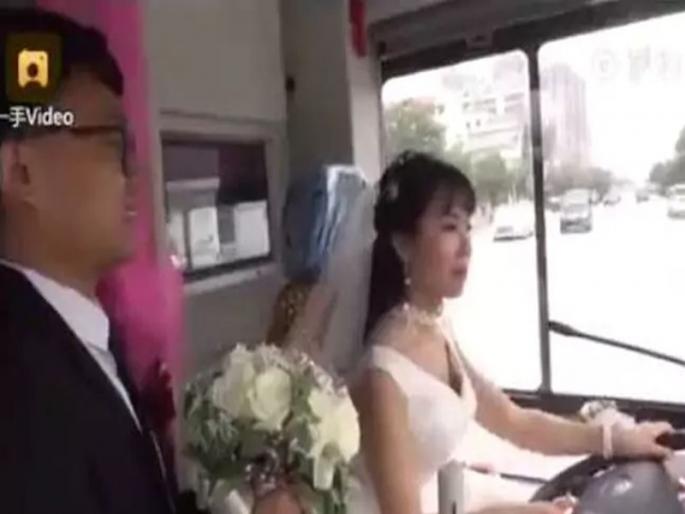 VIDEO: Bride Drives Bus To Wedding, Picks Groom On The Way | VIDEO: बस चालवत नवी नवरी पोहचली विवाह मंडपात, वाटेत पतीलाही केलं पिकअप VIDEO: Bride Drives Bus To Wedding, Picks Groom On The Way | VIDEO: बस चालवत नवी नवरी पोहचली विवाह मंडपात, वाटेत पतीलाही केलं पिकअप