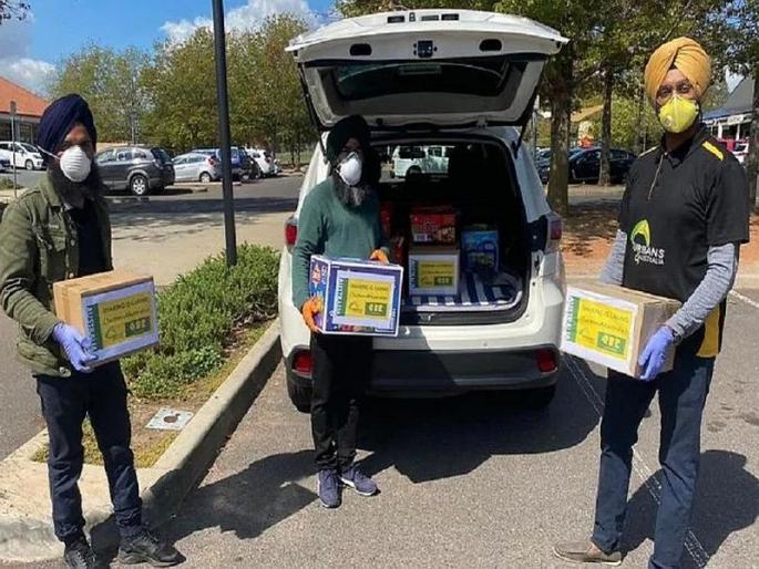 Sikh community is delivering free meals to Australians amid corona crisis sna | गौरवास्पद : शीख बांधवांनी मनं जिंकली, कोरोना संकटातही ऑस्ट्रेलियातील गरजूंना देतायेत मोफत भोजन Sikh community is delivering free meals to Australians amid corona crisis sna | गौरवास्पद : शीख बांधवांनी मनं जिंकली, कोरोना संकटातही ऑस्ट्रेलियातील गरजूंना देतायेत मोफत भोजन