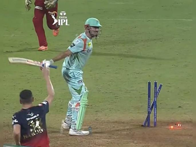 IPL 2022, RCB vs LSG Live Updates : Marcus Stoinis aggression while getting bowled by Josh Hazelwood & not given wide by umpire, Watch Video  | Marcus Stoinis IPL 2022, RCB vs LSG Live Updates : मार्कस स्टॉयनिस Umpireवर प्रचंड चिडला, शिविगाळ करत मैदानाबाहेर गेला; एका निर्णयाने सामना फिरला, Video 