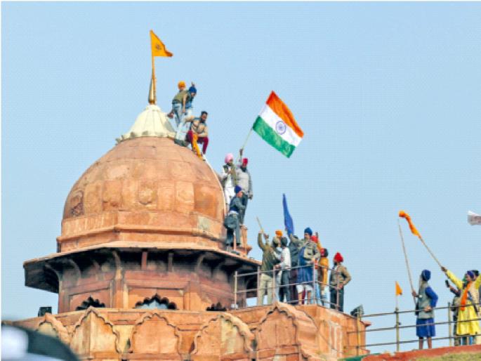 Delhi Violence: Huge Radha! Farmers infiltrated Delhi; The flag was hoisted on the red fort | Delhi Violence: प्रचंड राडा! शेतकरी दिल्लीत घुसले; लाल किल्ल्यावर फडकवला धर्मध्वज Delhi Violence: Huge Radha! Farmers infiltrated Delhi; The flag was hoisted on the red fort | Delhi Violence: प्रचंड राडा! शेतकरी दिल्लीत घुसले; लाल किल्ल्यावर फडकवला धर्मध्वज