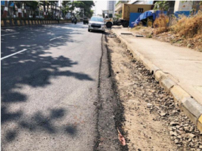 Four feet distance between road and sidewalk while working in Ghansoli area; Negligence in asphalting | घणसोली परिसरात कामे करताना रस्ता व पदपथामध्ये चार फुटांचे अंतर; डांबरीकरणात हलगर्जी Four feet distance between road and sidewalk while working in Ghansoli area; Negligence in asphalting | घणसोली परिसरात कामे करताना रस्ता व पदपथामध्ये चार फुटांचे अंतर; डांबरीकरणात हलगर्जी