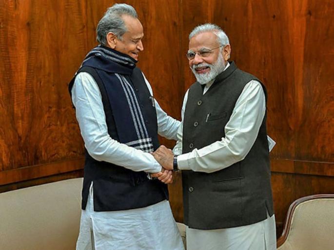 Why is PM Modi so happy with ashok gehlot Saying laddu in both hands and played big political move during flag off rajasthans first vande bharat express train | इतना भरोसा, इतना भरोसा...! PM मोदी गेहलोतांवर एवढे खूश का? दोन्ही हातात 'लड्डू' म्हणत खेळी मोठी चाल Why is PM Modi so happy with ashok gehlot Saying laddu in both hands and played big political move during flag off rajasthans first vande bharat express train | इतना भरोसा, इतना भरोसा...! PM मोदी गेहलोतांवर एवढे खूश का? दोन्ही हातात 'लड्डू' म्हणत खेळी मोठी चाल