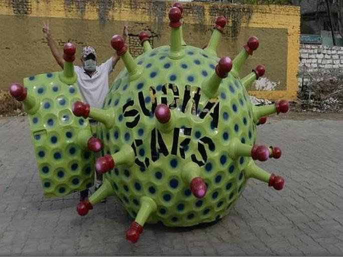 Now k sudhakar mead cororna virus car in Hyderabad | Video : कोरोना 'हेल्मेट'नंतर आता रस्त्यावर उतरली कोरोना 'कार', 6 चाकांची ही कार पाहून तुम्हीही व्हाल हैराण Now k sudhakar mead cororna virus car in Hyderabad | Video : कोरोना 'हेल्मेट'नंतर आता रस्त्यावर उतरली कोरोना 'कार', 6 चाकांची ही कार पाहून तुम्हीही व्हाल हैराण