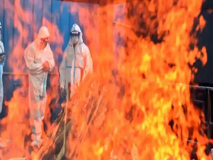 CoronaVirus Father died by covid-19 daughter jumped into burning pyre in rajasthan barmer | CoronaVirus : धक्कादायक...! कोरोनामुळे वडिलांचा मृत्यू; मुलीनं जळत्या चितेवर घेतली उडी CoronaVirus Father died by covid-19 daughter jumped into burning pyre in rajasthan barmer | CoronaVirus : धक्कादायक...! कोरोनामुळे वडिलांचा मृत्यू; मुलीनं जळत्या चितेवर घेतली उडी