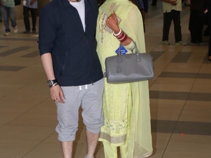 Neil Nitin mukesh with wife at the domestic airport | Neil Nitin mukesh with wife at the domestic airport