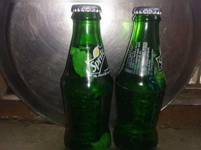 Condom packets found in packed cold drink bottle in UP Village | कोल्ड ड्रिंकच्या बॉटलमध्ये कंडोम आणि जलजीऱ्याचं पाकीट, ग्राहकासह दुकानदारही हैराण.... Condom packets found in packed cold drink bottle in UP Village | कोल्ड ड्रिंकच्या बॉटलमध्ये कंडोम आणि जलजीऱ्याचं पाकीट, ग्राहकासह दुकानदारही हैराण....