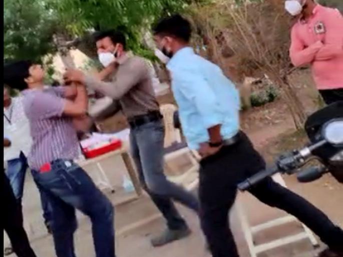 CoronaVirus News Former congress MLA lawrence gedam son beats doctor in covid hospital | CoronaVirus News: कोविड रुग्णालयाच्या डॉक्टरला माजी आमदार पुत्राकडून मारहाण; व्हिडीओ व्हायरल CoronaVirus News Former congress MLA lawrence gedam son beats doctor in covid hospital | CoronaVirus News: कोविड रुग्णालयाच्या डॉक्टरला माजी आमदार पुत्राकडून मारहाण; व्हिडीओ व्हायरल