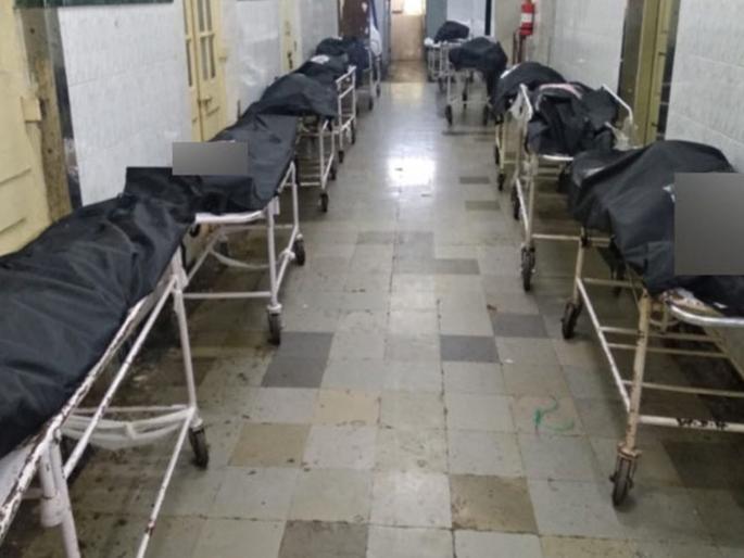 CoronaVirus thane News crematorium record 490 corona deaths but tmc dashboard only shows 57 deaths | CoronaVirus News: 'त्या' ४३३ मृतदेहांचं काय झालं? ठाण्यातील कोरोना मृतांच्या संख्येवरून मोठा संभ्रम CoronaVirus thane News crematorium record 490 corona deaths but tmc dashboard only shows 57 deaths | CoronaVirus News: 'त्या' ४३३ मृतदेहांचं काय झालं? ठाण्यातील कोरोना मृतांच्या संख्येवरून मोठा संभ्रम