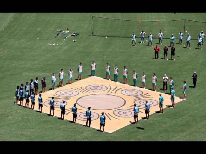 India Vs Australia : India & Australia teams made a barefoot circle together ahead of the first ODI against racism, Video | India Vs Australia : टॉसपूर्वी दोन्ही संघाचे खेळाडू अनवाणी पायानं मैदानावर आले, पण का?; Video
