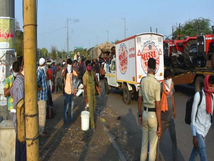 5 km footpath of laborers | उपाशीपोटी मजुरांची ३०० किमीची पायपीट 5 km footpath of laborers | उपाशीपोटी मजुरांची ३०० किमीची पायपीट