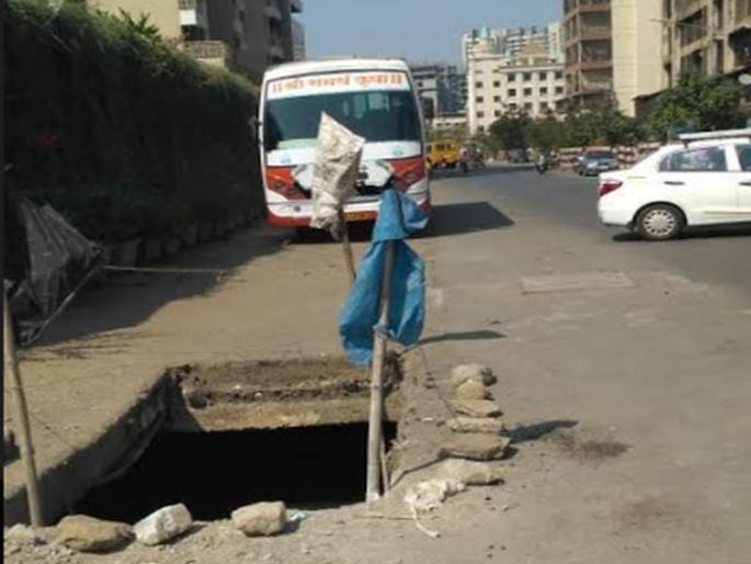 heavy vehicles parking news | अवजड वाहनांमुळे पालिकेच्या नाल्याचे स्लॅब तुटल्याने अपघाताची भीती heavy vehicles parking news | अवजड वाहनांमुळे पालिकेच्या नाल्याचे स्लॅब तुटल्याने अपघाताची भीती