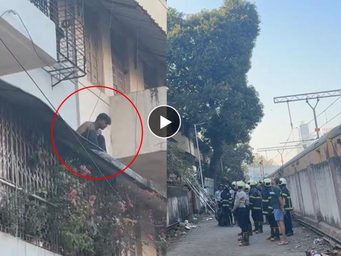 unknown person is jumping from one building to another in dadar police reached at the spot | VIDEO: दादरमध्ये अजब प्रकार, एक तरुण या इमारतीवरुन त्या इमारतीवर मारतोय उड्या; पोलिसांची दमछाक unknown person is jumping from one building to another in dadar police reached at the spot | VIDEO: दादरमध्ये अजब प्रकार, एक तरुण या इमारतीवरुन त्या इमारतीवर मारतोय उड्या; पोलिसांची दमछाक