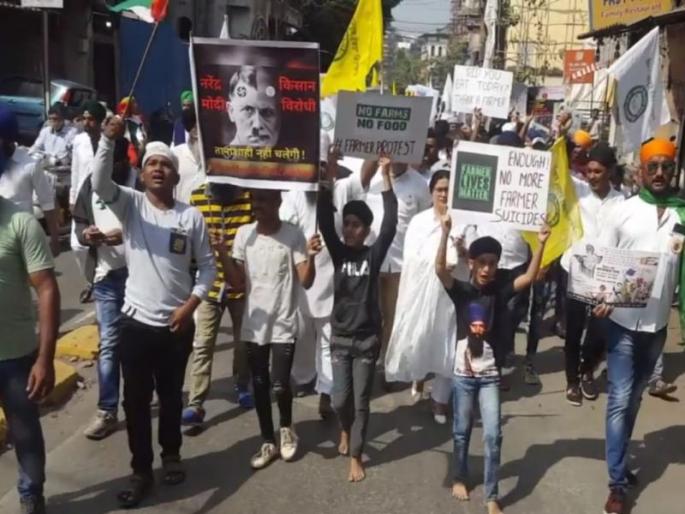 Rally in support of farmers from NCP; Republic Day celebrations in Ulhasnagar | राष्ट्रवादीकडून शेतकरी समर्थनार्थ रॅली; उल्हासनगरात प्रजासत्ताक दिन उत्साहात साजरा Rally in support of farmers from NCP; Republic Day celebrations in Ulhasnagar | राष्ट्रवादीकडून शेतकरी समर्थनार्थ रॅली; उल्हासनगरात प्रजासत्ताक दिन उत्साहात साजरा